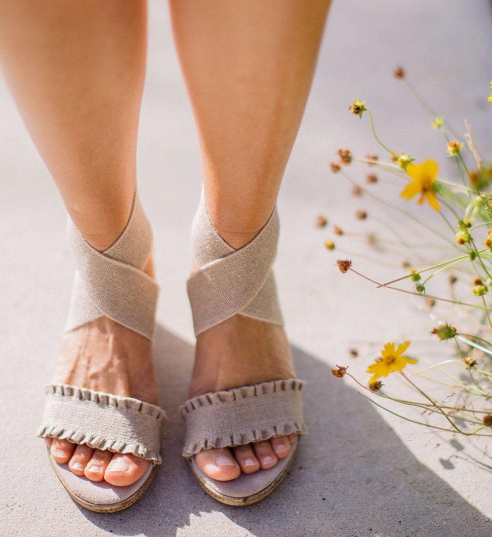pair of tan wedges
