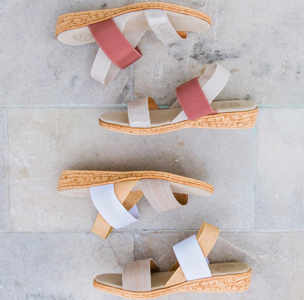 a couple of pairs of collins sandals