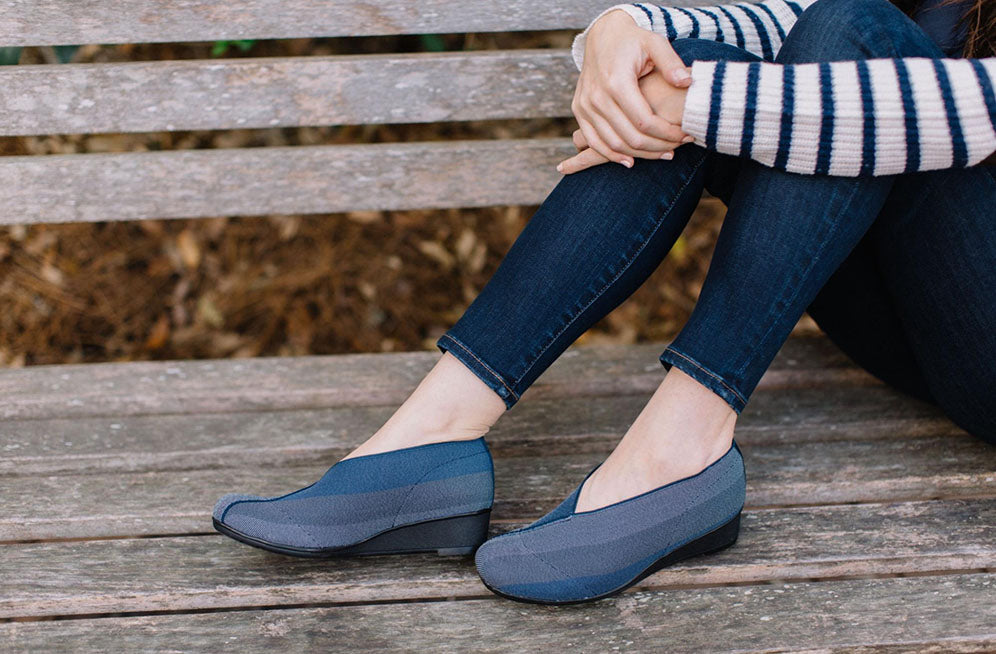 woman wearing blue high heels